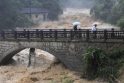 Kinijoje per potvynius ir žemės nuošliaužas žuvo 88 žmonės