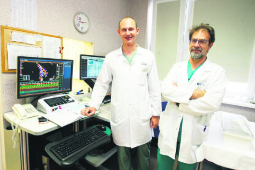 Pasiekimas: kardiologai elektrofiziologai J.Jarašūnas (kairėje) ir A. Poviliūnas džiaugiasi, kad nuo šiol pacientams gali pasiūlyti naujausią gydymo metodą širdies aritmijoms.