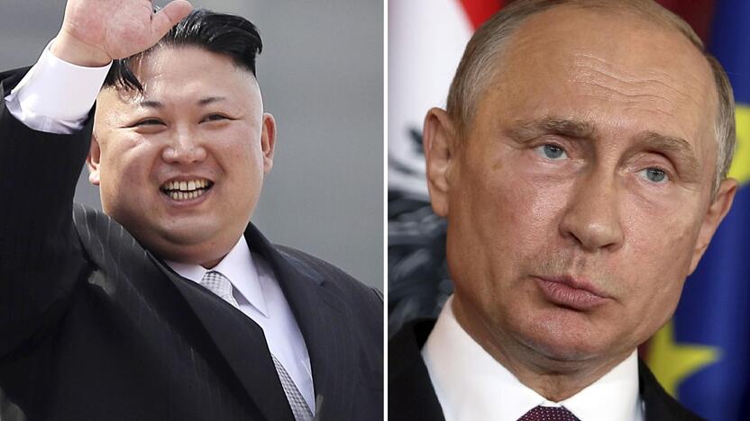 Kim Jong Unas (kairėje) ir Vladimiras Putinas (dešinėje)