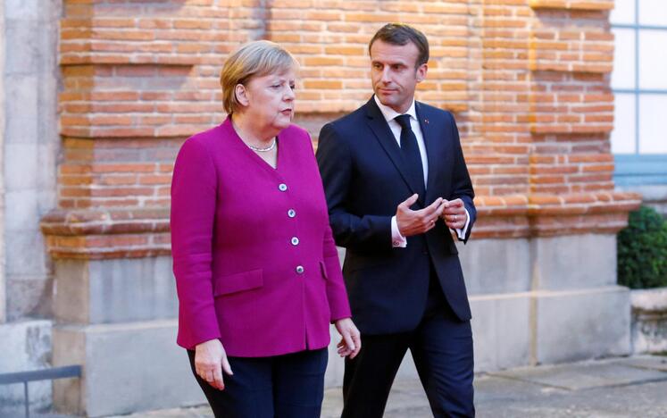 Angela Merkel ir Emmanuelis Macronas 