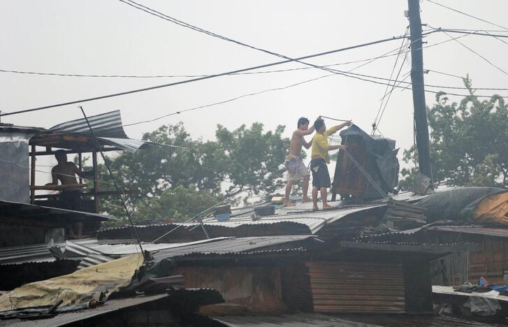 Filipinų sostinę paralyžiavo taifūnas