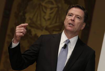 Jamesas Comey