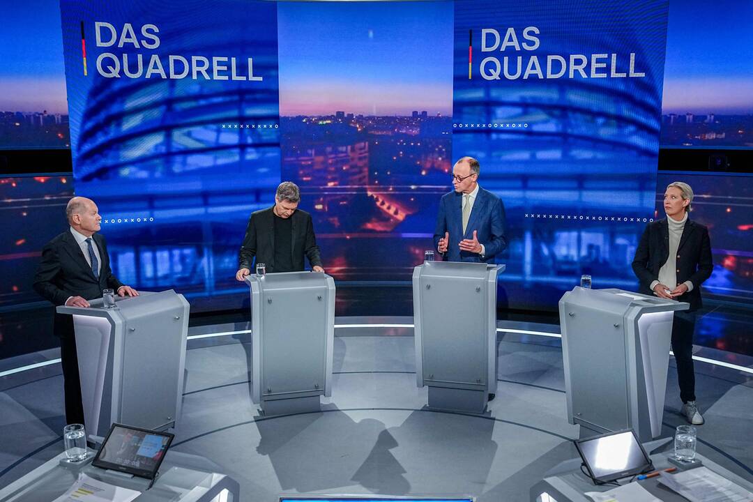 Paskutines rinkimų kampanijos dienas Vokietijoje lydi įtampa dėl JAV
