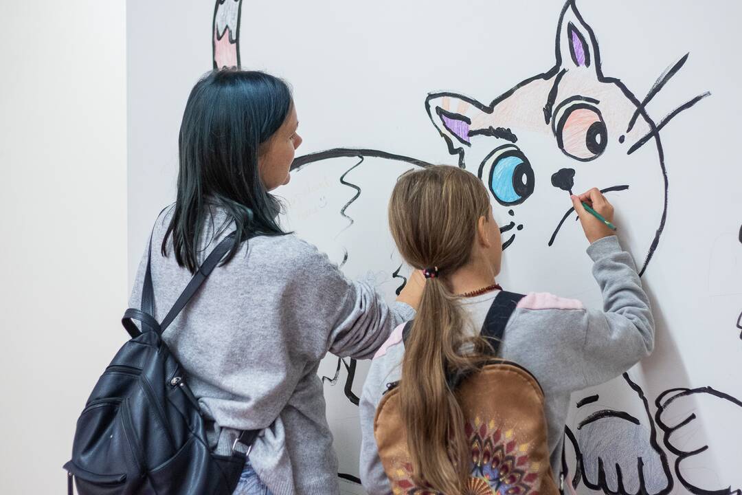 Autorė: D.Bieliūnaitė prie komikso apie menininkus L.Truikį ir M.Rakauskaitę. 