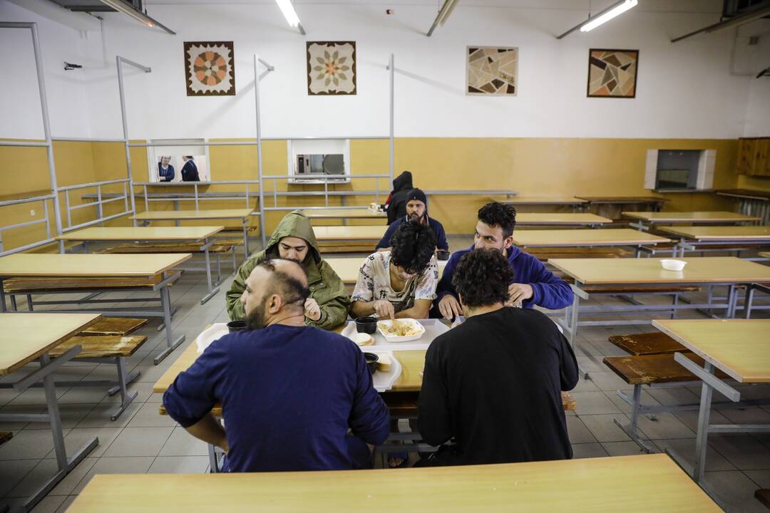 Migrantai Kybartų užsieniečių registracijos centre