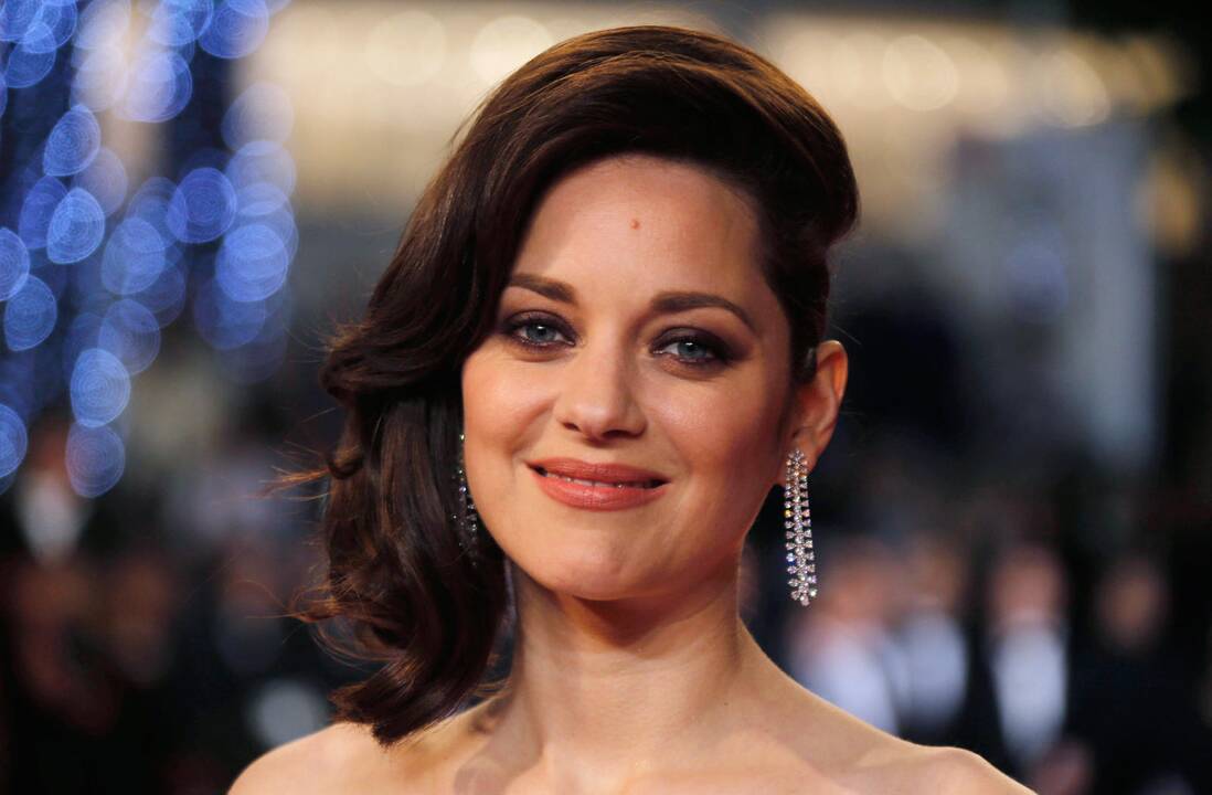 M. Cotillard paskelbė apie nėštumą ir paneigė mezgusi romaną su B. Pittu