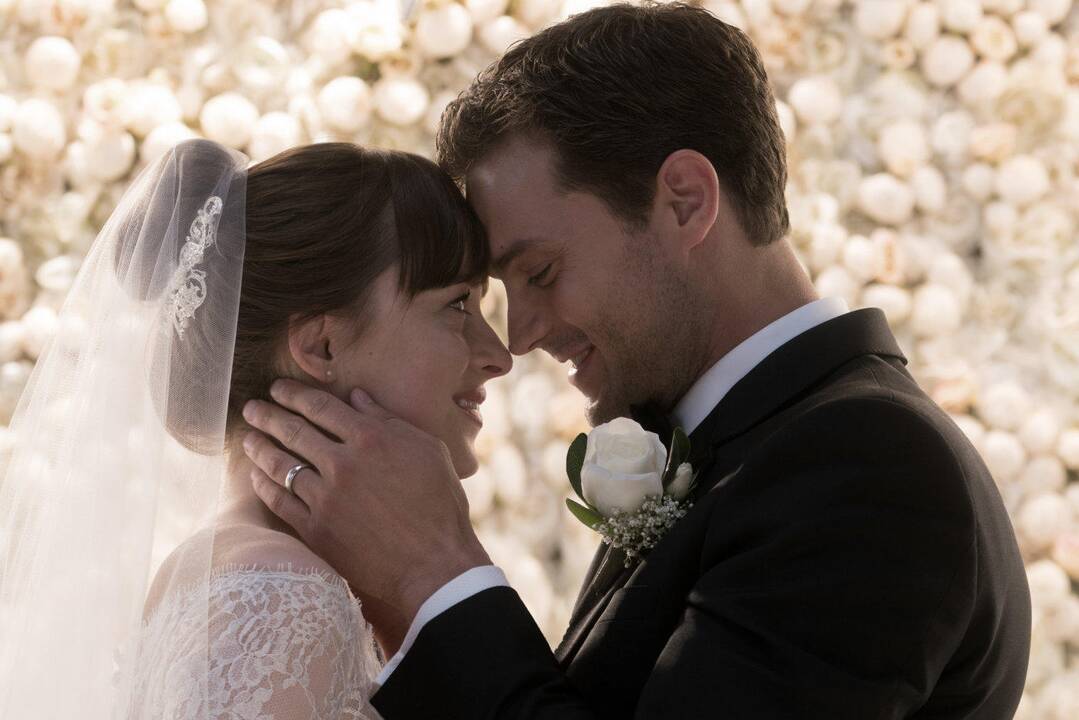 Dakota Johnson ir Chrisas Martinas