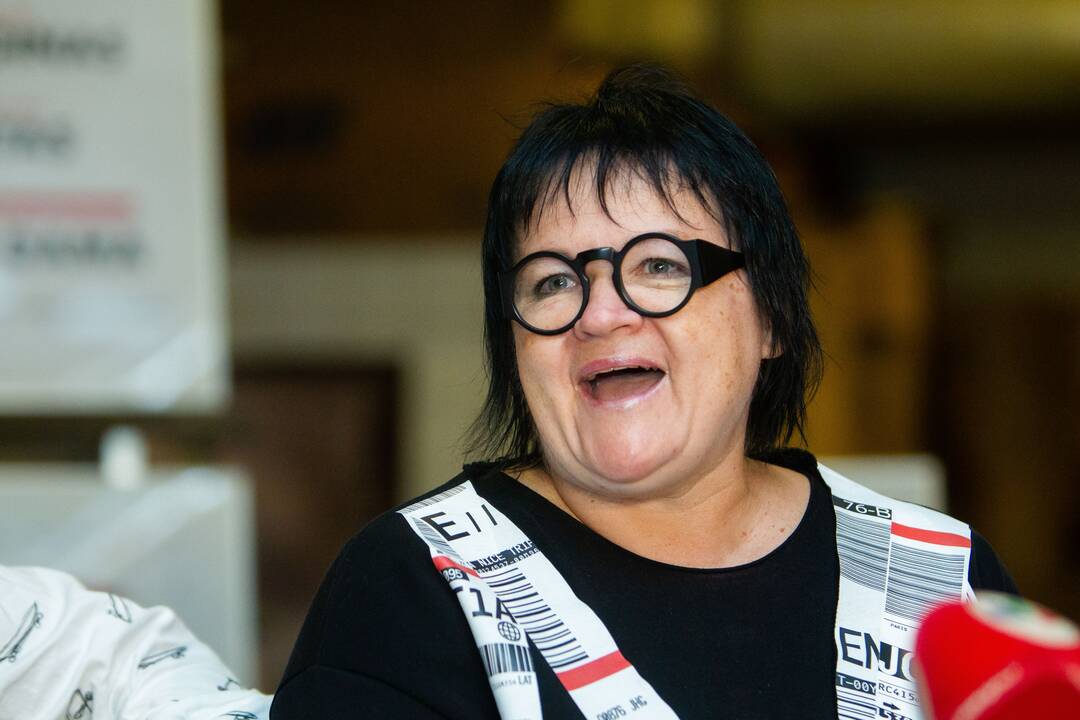 Eltonas Johnas ir Dalia Ibelhauptaitė