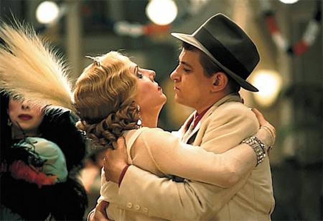 Kadras iš E.Scola muzikinės kino dramos „Balius“.
