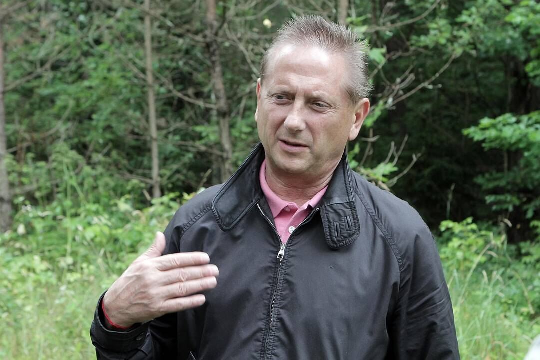 Elgesys: teisme sutikta O.Gončaruk vengė "Kauno dienos" žurnalistų dėmesio.