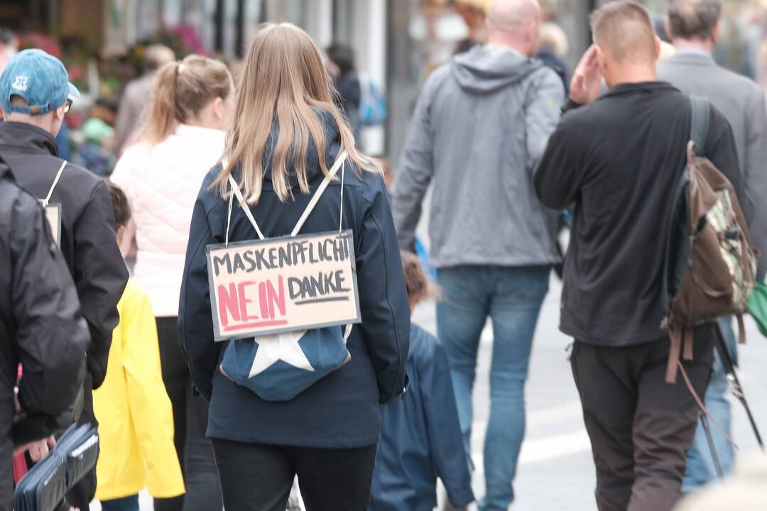 Protestai prieš viešojo gyvenimo apribojimus