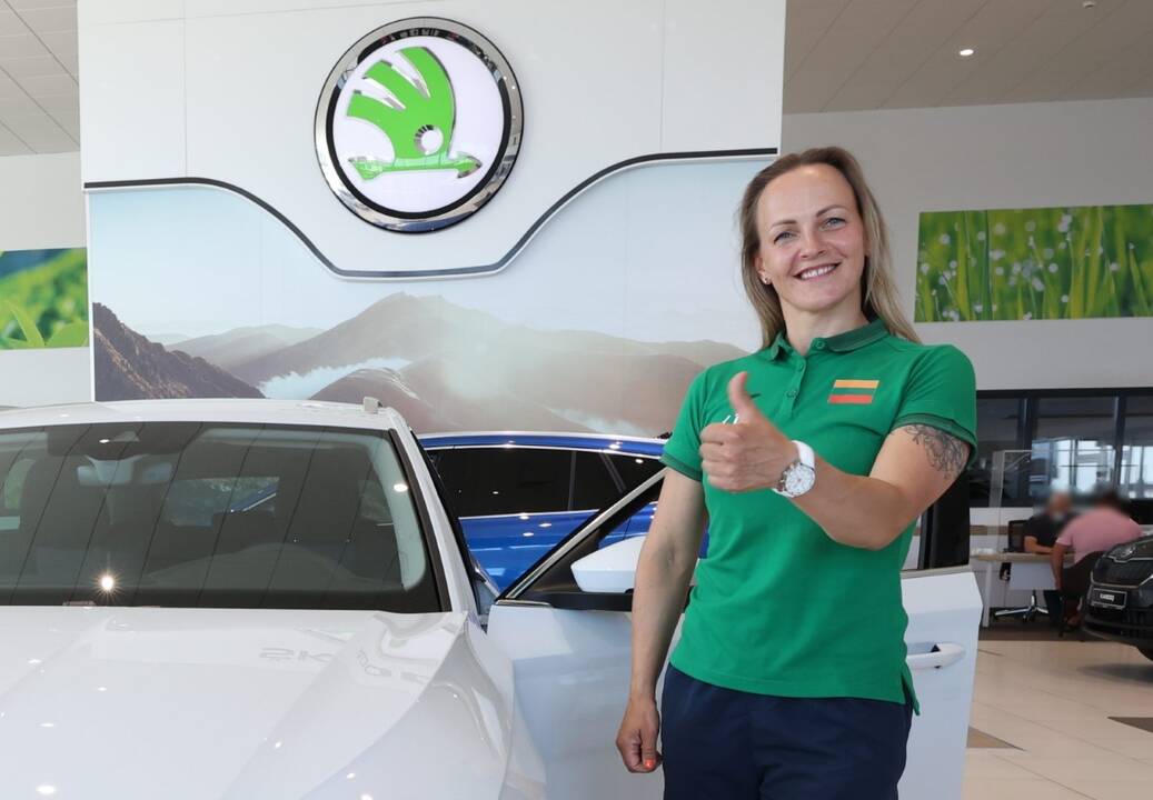  Simona Krupeckaitė su savo treneriu ir vyru Dmitrijumi Leopoldu