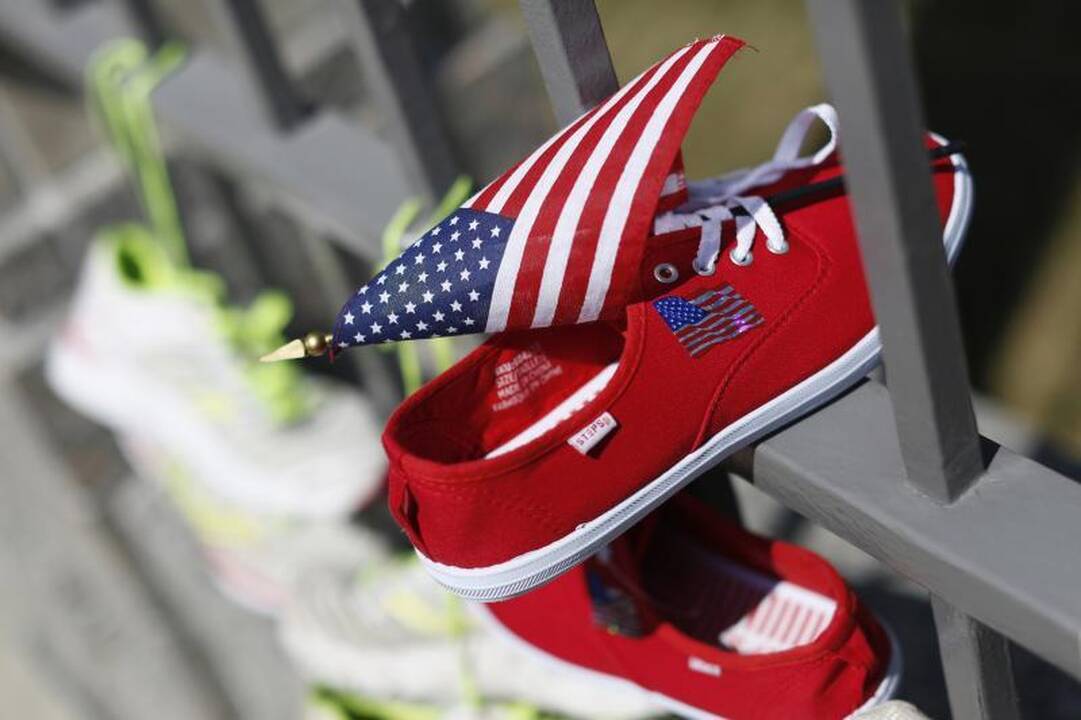 Savaitę po Bostono maratono gyventojai paminėjo tylos minute