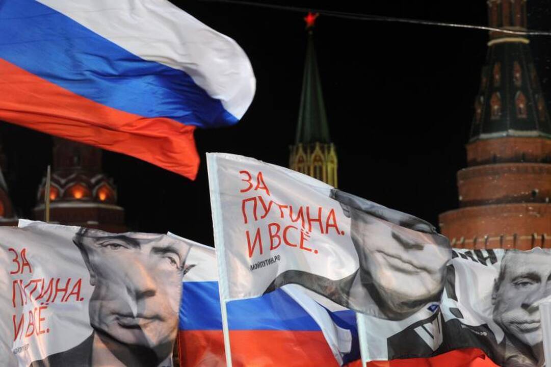 Rusijoje suskaičiavus 100 proc. balsų, V.Putinui teko 63,6 proc.