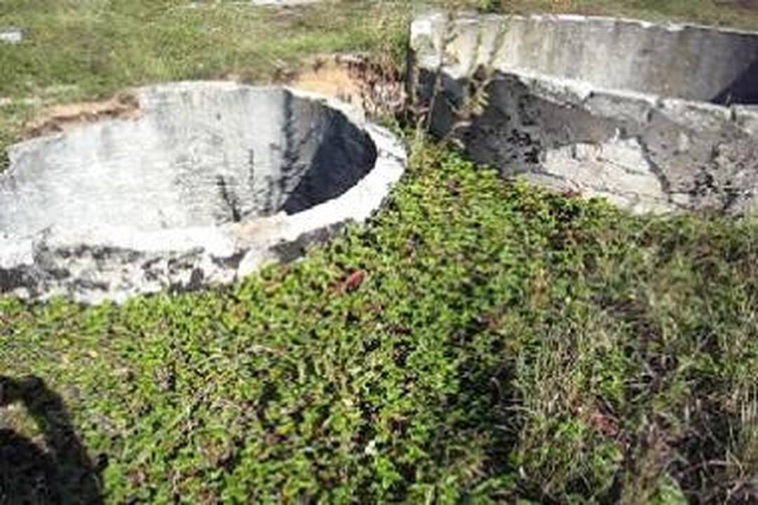 Sodų kaimynystėje - didžiuliai atviri šuliniai