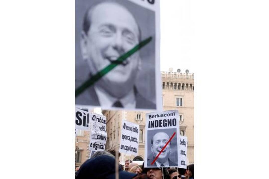 Italijos premjeras numojo ranka į masinį moterų protestą