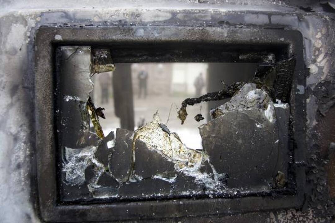 Vilniuje liepsnojo inkasatorių automobilis su pinigais (papildyta)