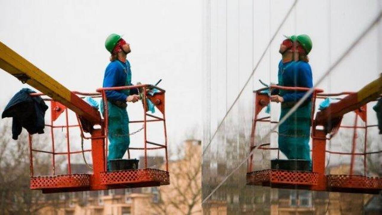 Langų valytojams - pats įkarštis, jie nespėja suktis 