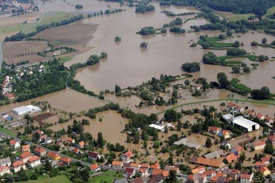 Liūtys ir potvyniai vėl užklupo Lenkiją ir jos kaimynes