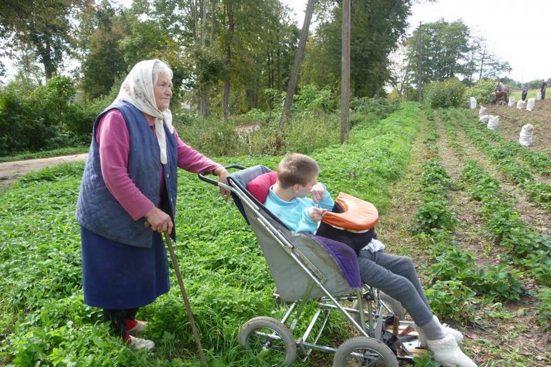 Pedagogės fotografijose – švelnus ir liūdnas kaimo veidas 