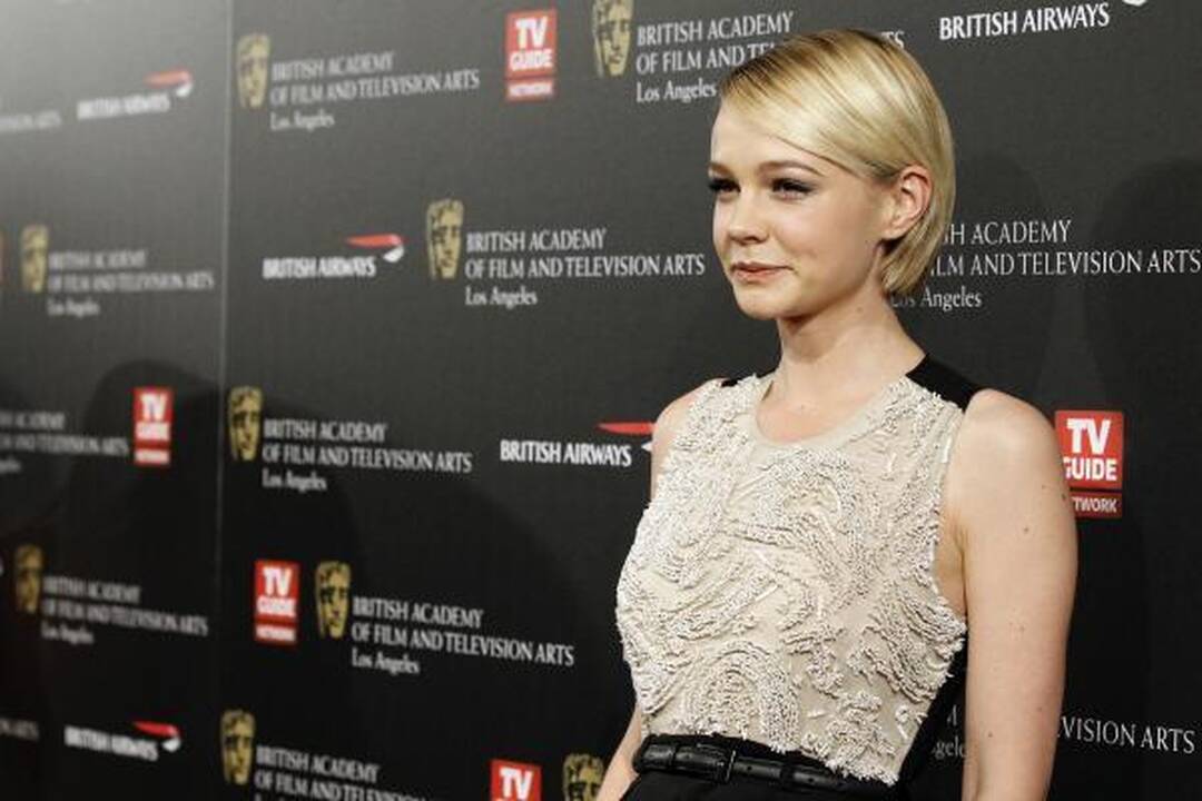 Žurnalas „Vogue“ išrinko K.Moss geriausiai besirengiančia dešimtmečio moterimi