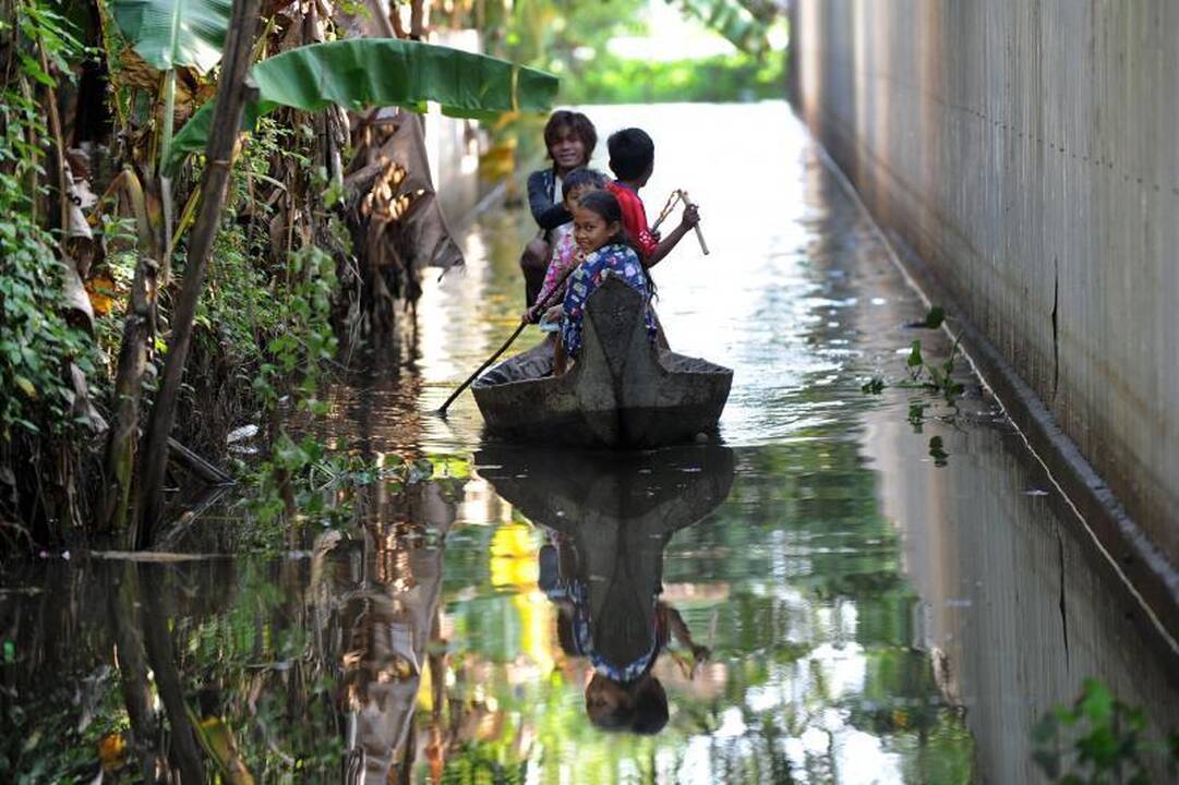 Vietname potvyniai nusinešė apie 100 žmonių gyvybių