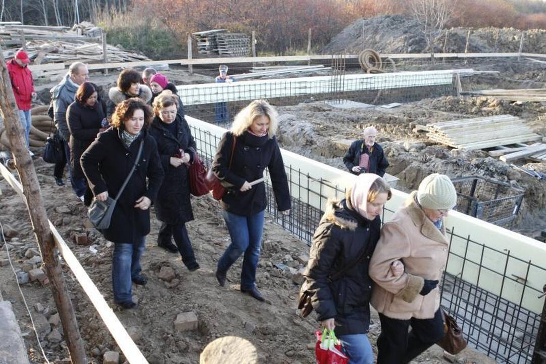 Dvasinės paramos centro pamatus sutvirtino atminimo simboliais  