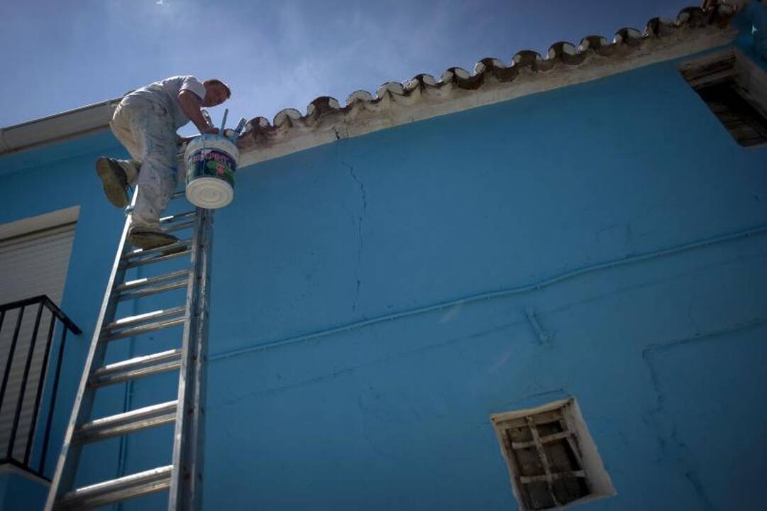 Turistai plūsta į mėlynąjį „smurfų kaimelį“