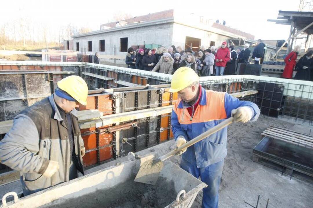 Dvasinės paramos centro pamatus sutvirtino atminimo simboliais  