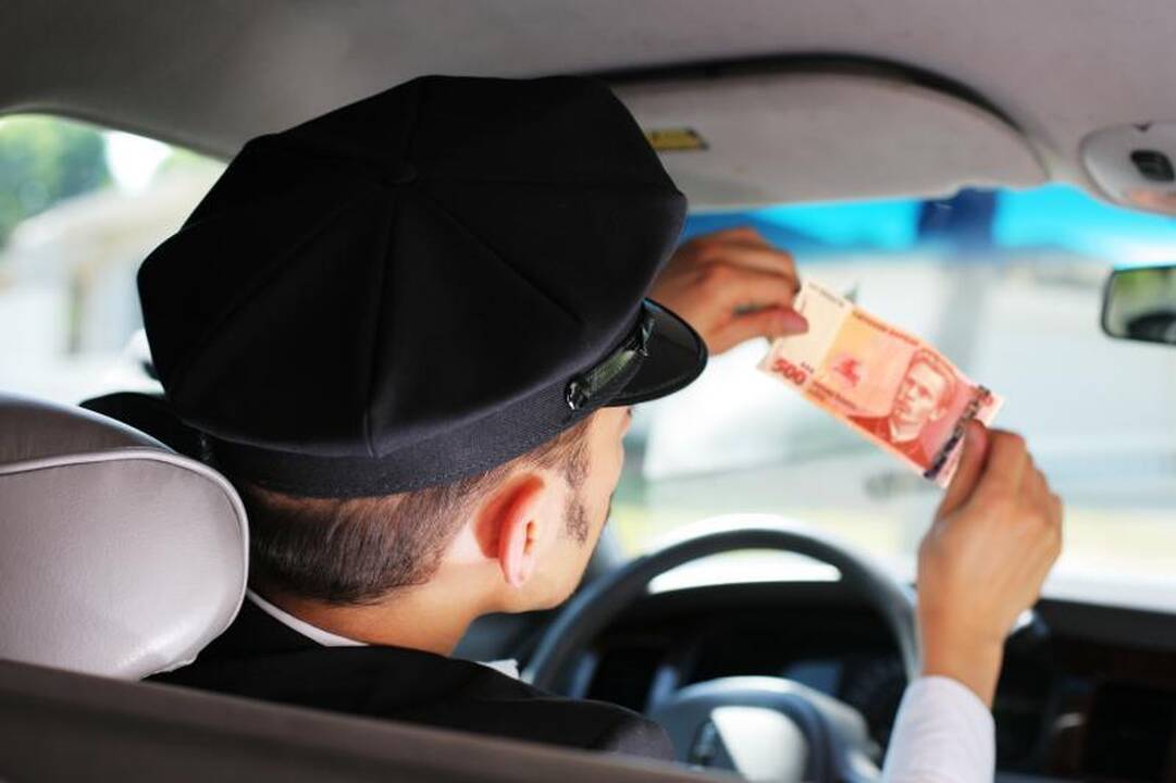 Baudos chamiškai besielgiančių taksistų negąsdina