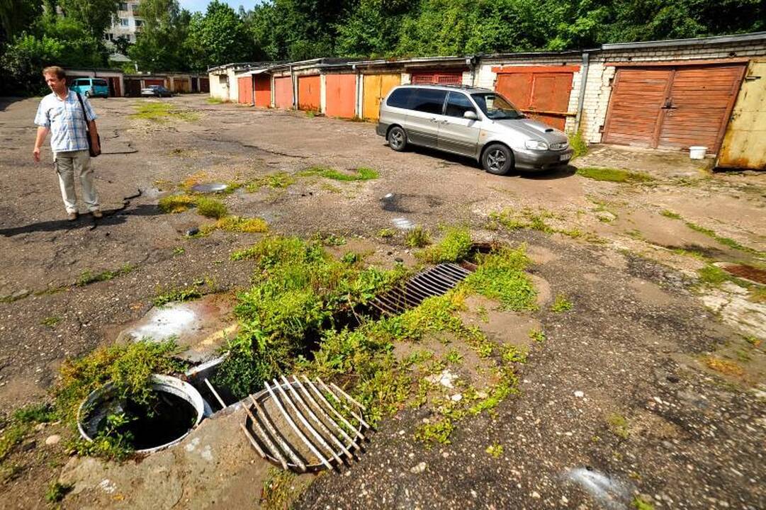 Garažų savininkai pralaimi kovą    su vandeniu