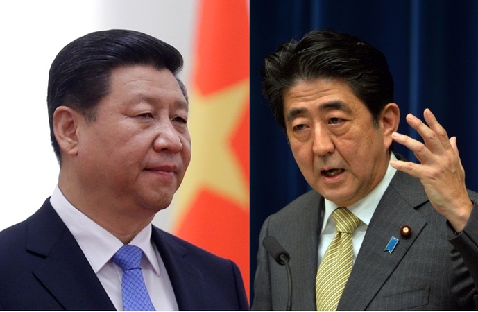 Xi Jinpingas ir Shinzo Abe 