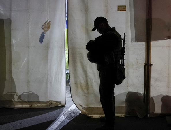 Lietuviai padeda rinkti karo nusikaltimų įrodymus: į Ukrainą išvyko slapta