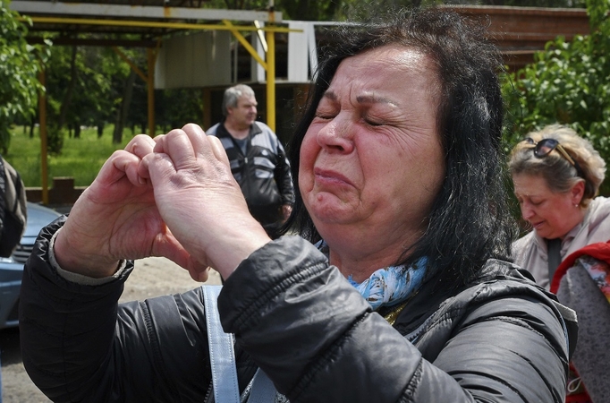 Ministras: Ukrainoje iki šiol gauta pranešimų apie 20 tūkst. įtariamų karo nusikaltimų