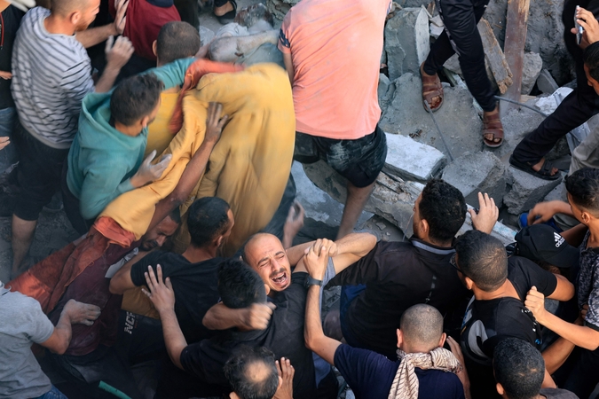 Ragina nedelsiant paskelbti humanitarinę pertrauką Gazos Ruože