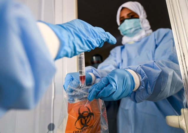 Kinija atmeta įtarimus, kad COVID-19 galėjo prasidėti laboratorijoje netoli Uhano