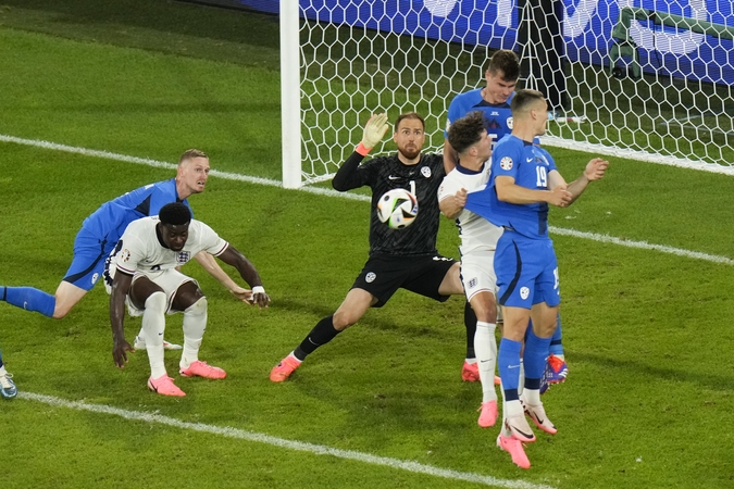 Anglijos ir Slovėnijos rinktinių rungtynių momentas