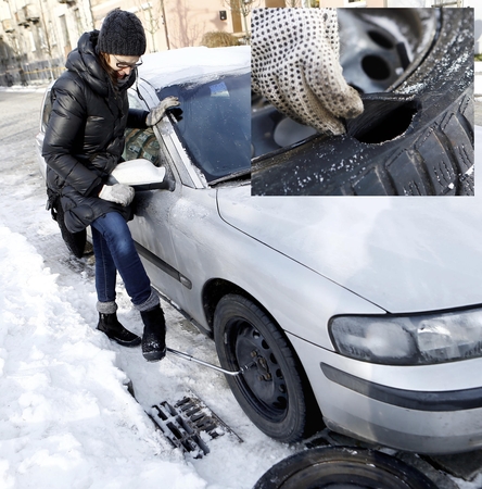 Netikėtumas: jauna moteris nustebo, kai pamatė suplėšytą padangą.