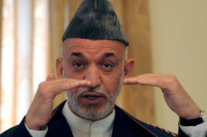"WikiLeaks": H.Karzai brolis yra "korumpuotas narkotikų baronas"