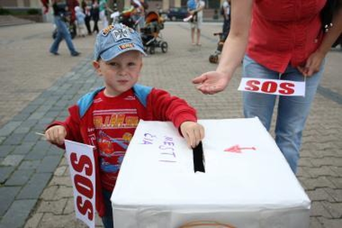 Motinystės pašalpų klausimas: Seimas daro pertrauką 