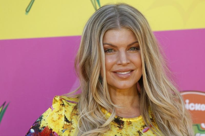 Garsi atlikėja Fergie nebeslepia augančio pilvuko (foto)