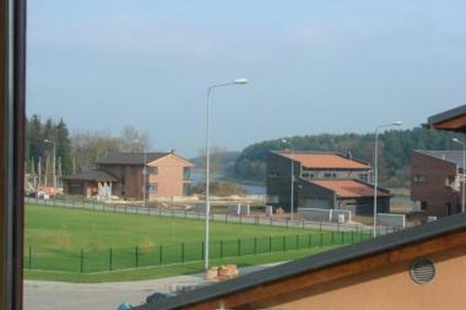 Namų kainos Britanijoje ir toliau smunka