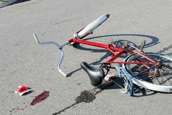 Motociklininkas užmušė 8-metį dviratininką