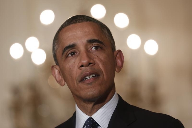 B. Obama nenori parodomojo fotografavimosi su N. Mandela