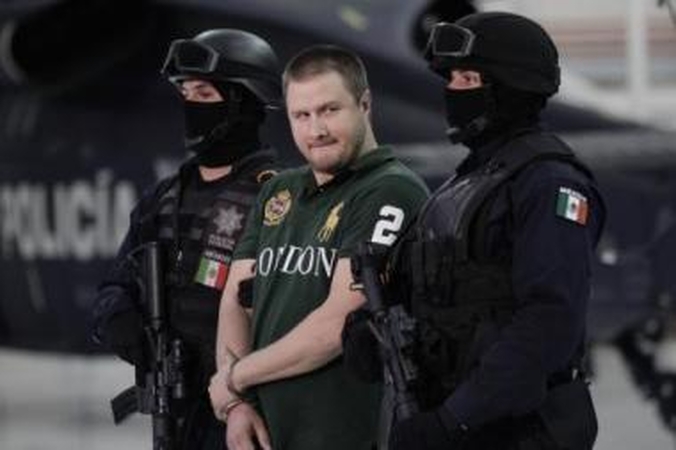 Karjera: 37-erių E.Valdezas-Villarrealo (centre) – vienintelis žinomas JAV pilietis, kuris pasiekė tokių aukštumų sudėtingoje Meksikos kartelių struktūroje.