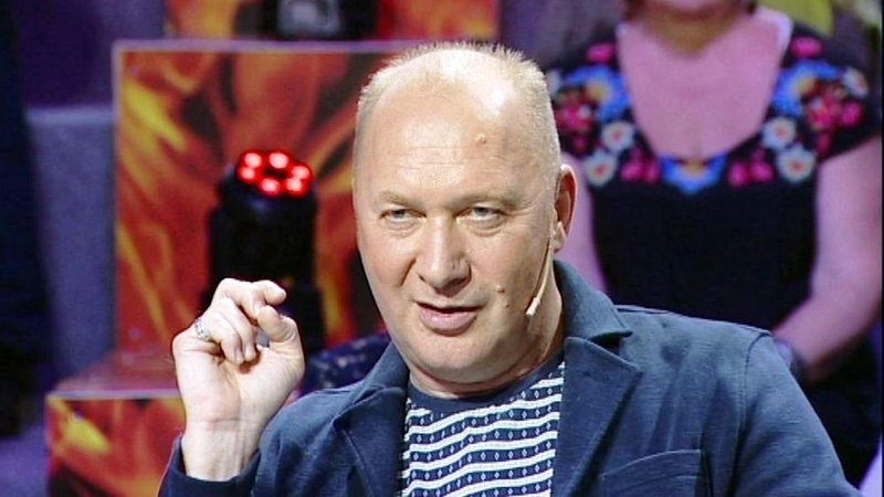 Ką J. Smoriginas pareiškė, pažvelgęs į R. Ščiogolevaitės krūtinę?
